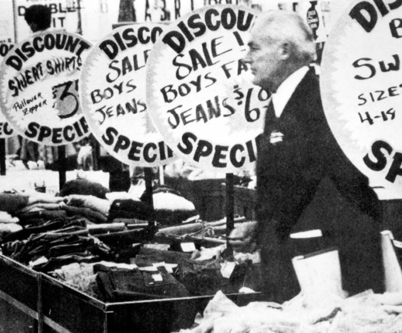 Sam Walton walks around a Walmart Store in the 1970s.