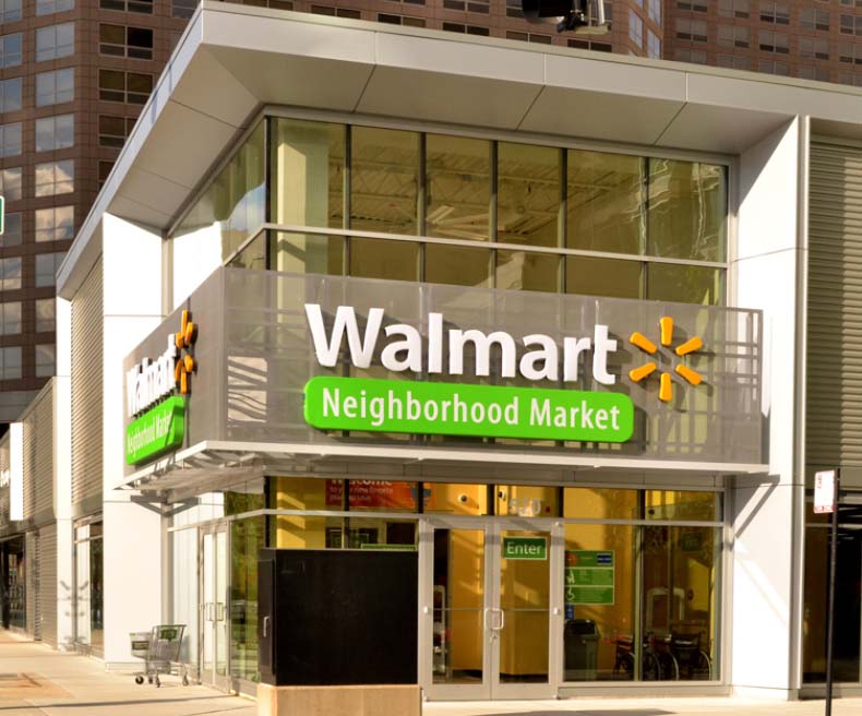 Walmart Neighborhood Market storefront on street corner.