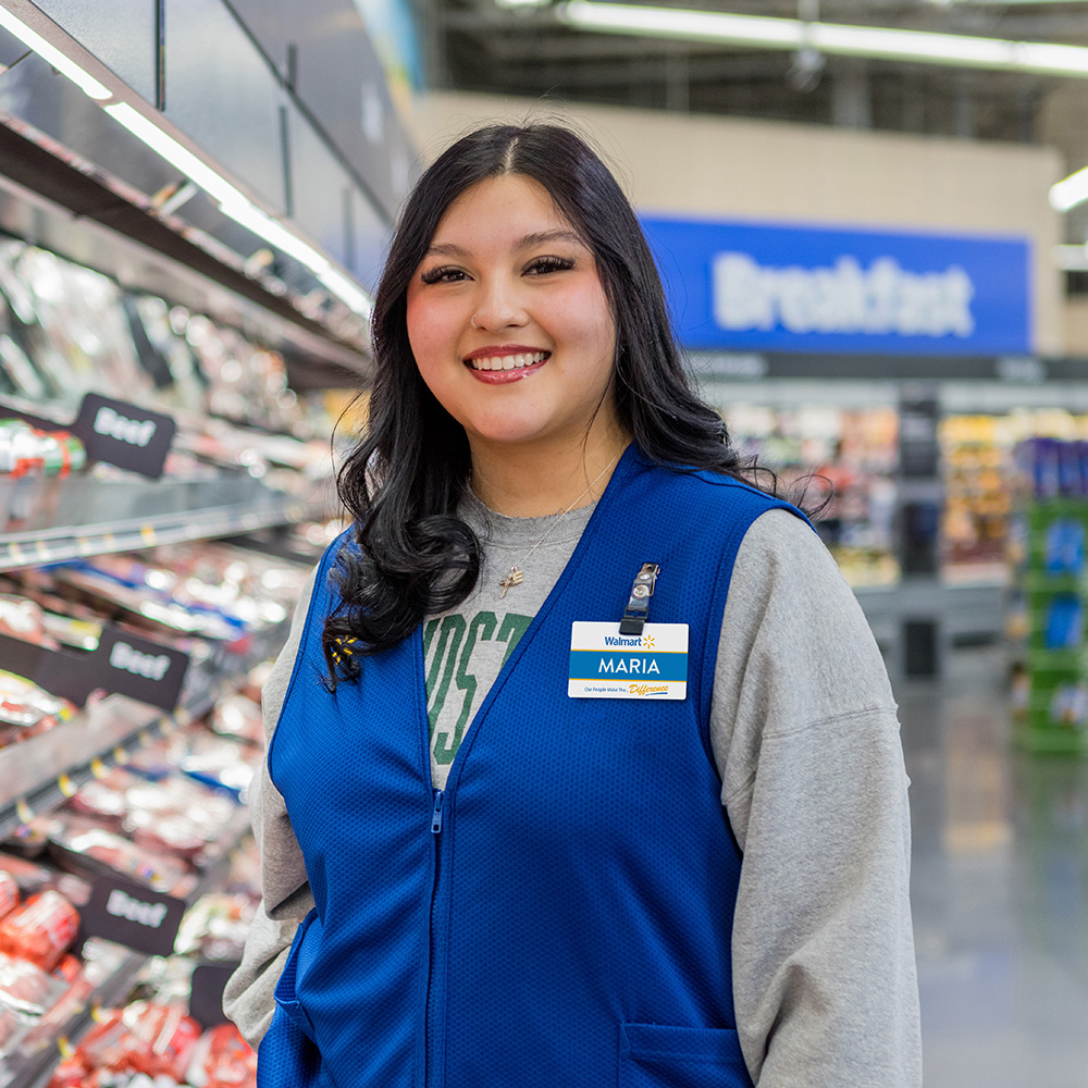 Associate Maria smiling at camera