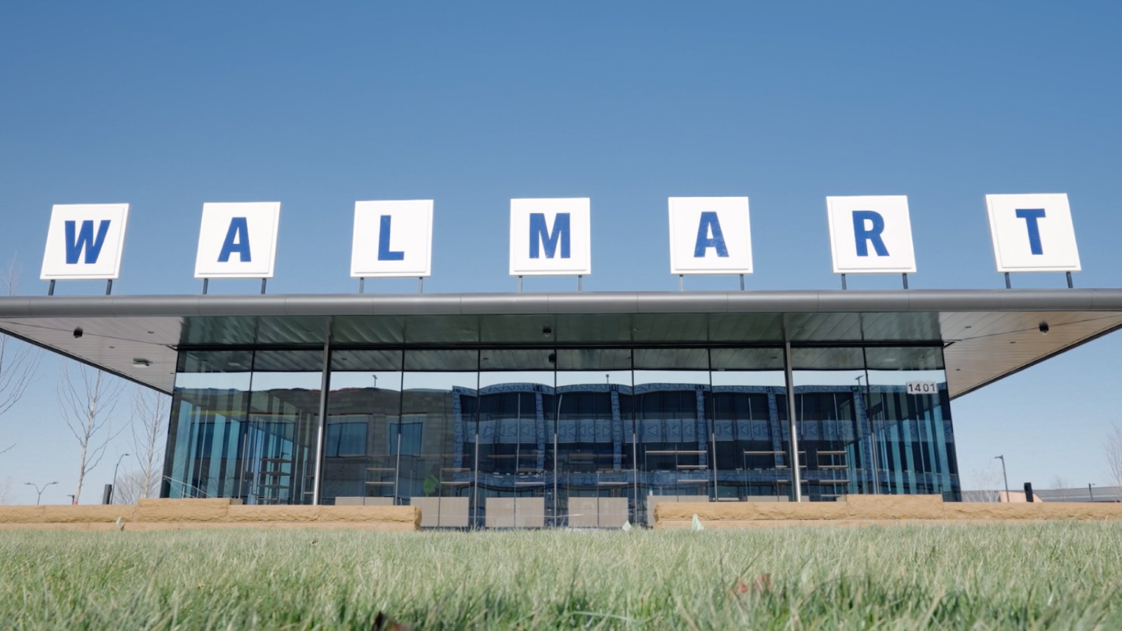 Walmart sign outside of the Walmart home office