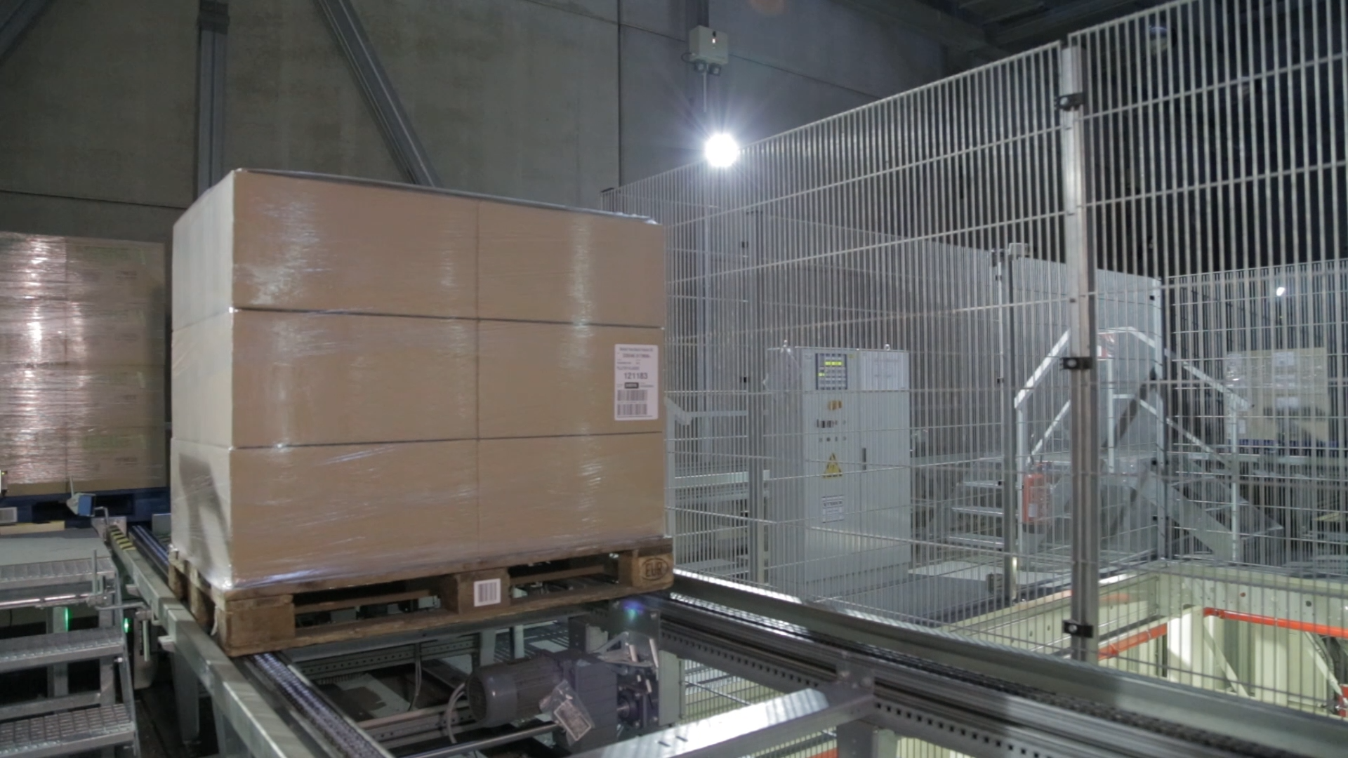 Pallets move through a high-tech distribution center