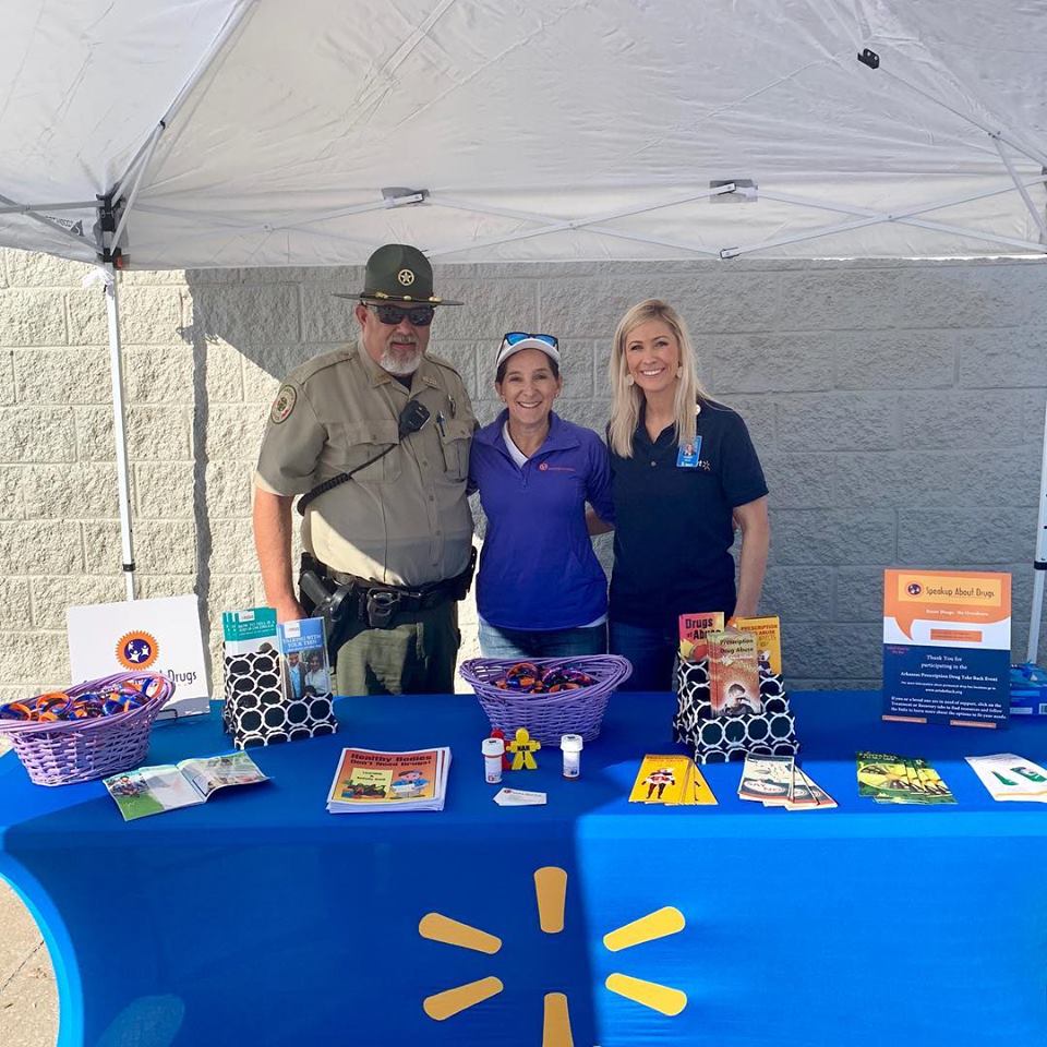 Gina at Walmart booth about Drug Awareness with local Sheriff