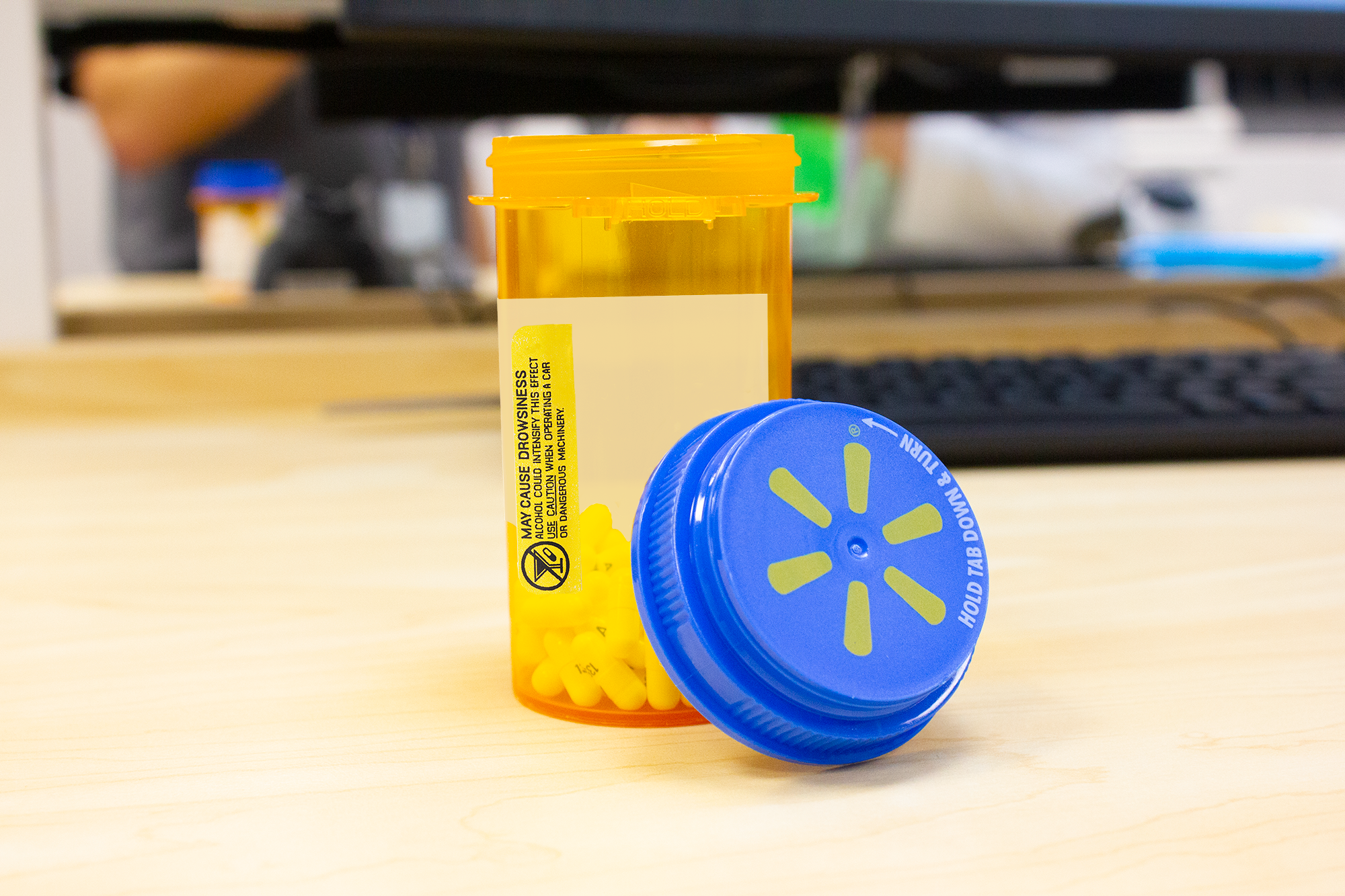 Pill bottle on desk