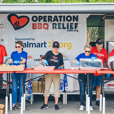 Operation BBQ Relief volunteers prepare meals for those affected by disasters.