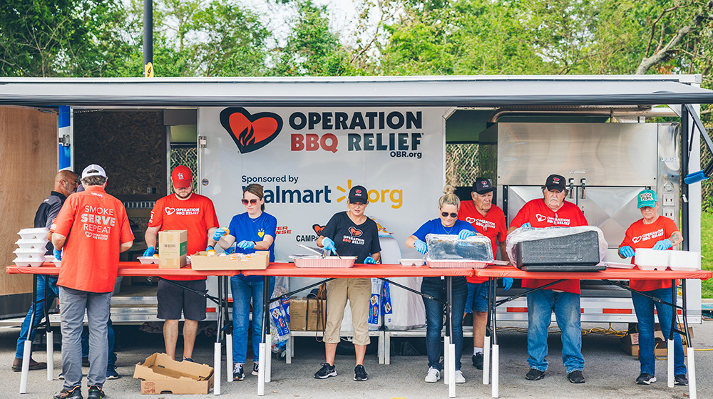 Operation BBQ Relief volunteers prepare meals for those affected by disasters.