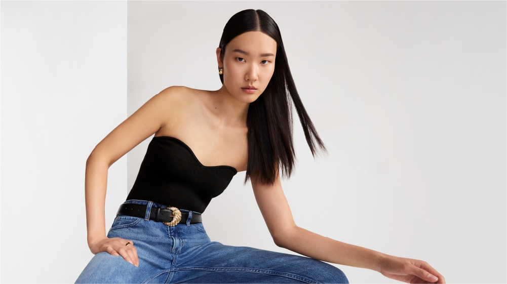 Girl wearing clothes from Devil Wears Prada colab.