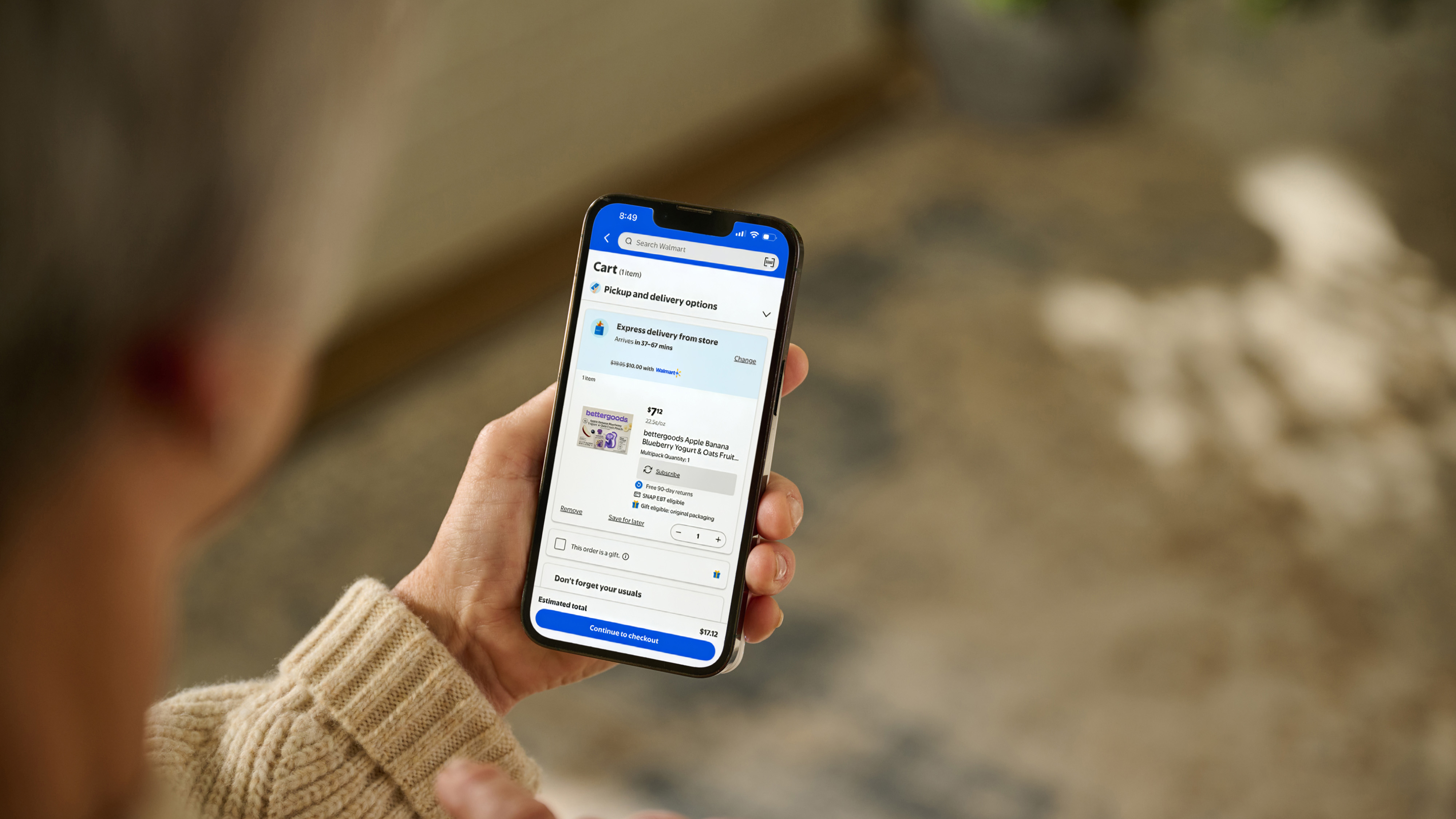 Person Using Smartphone for Walmart Express Delivery