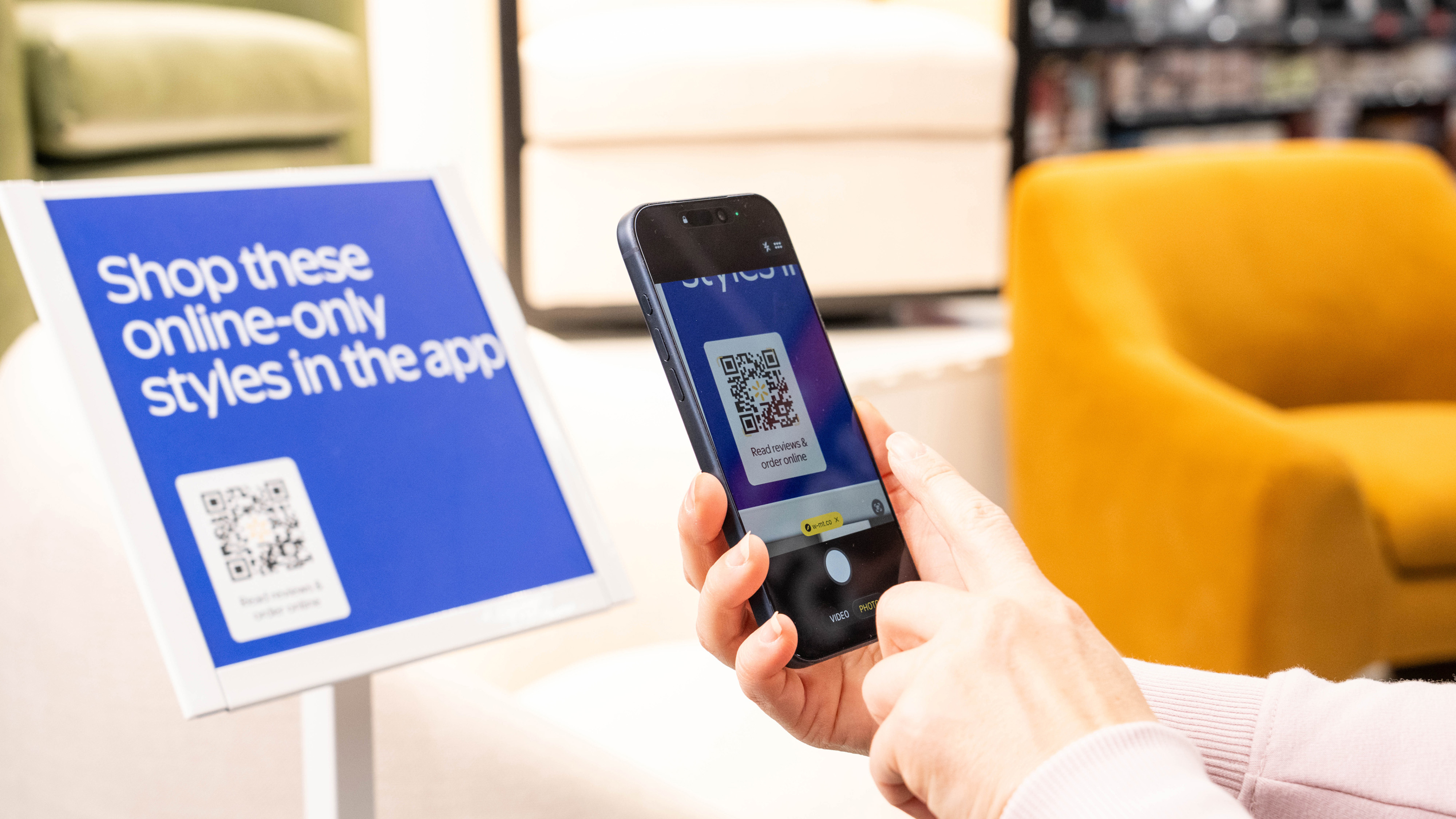 Customer Scanning QR Code in Walmart For Online Shopping