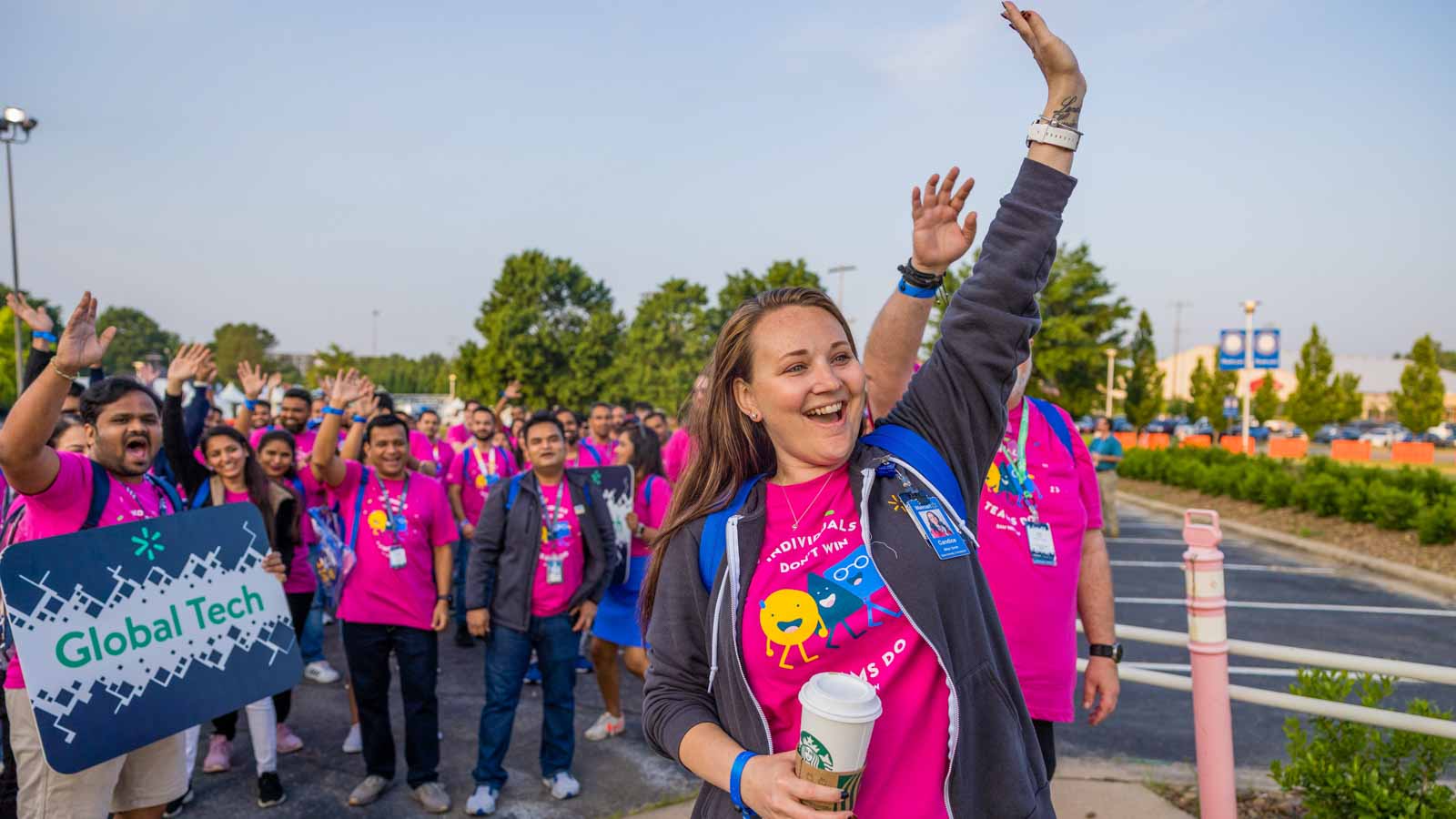 Group of Global Tech associates arrive at Associate Celebration.