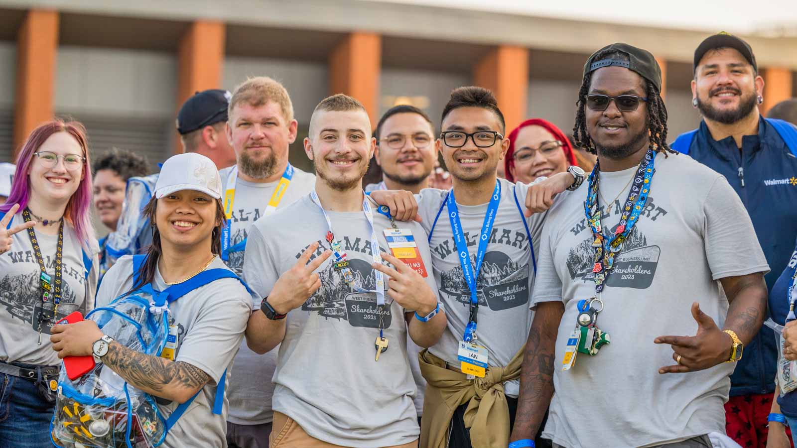 A group of associates wearing vintage Walmart shirts.
