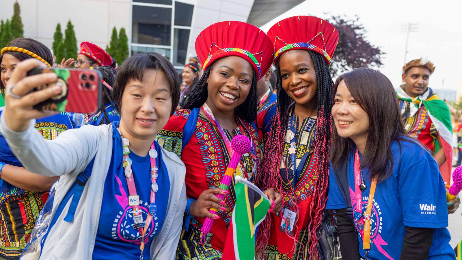 International associates from different countries pose together.