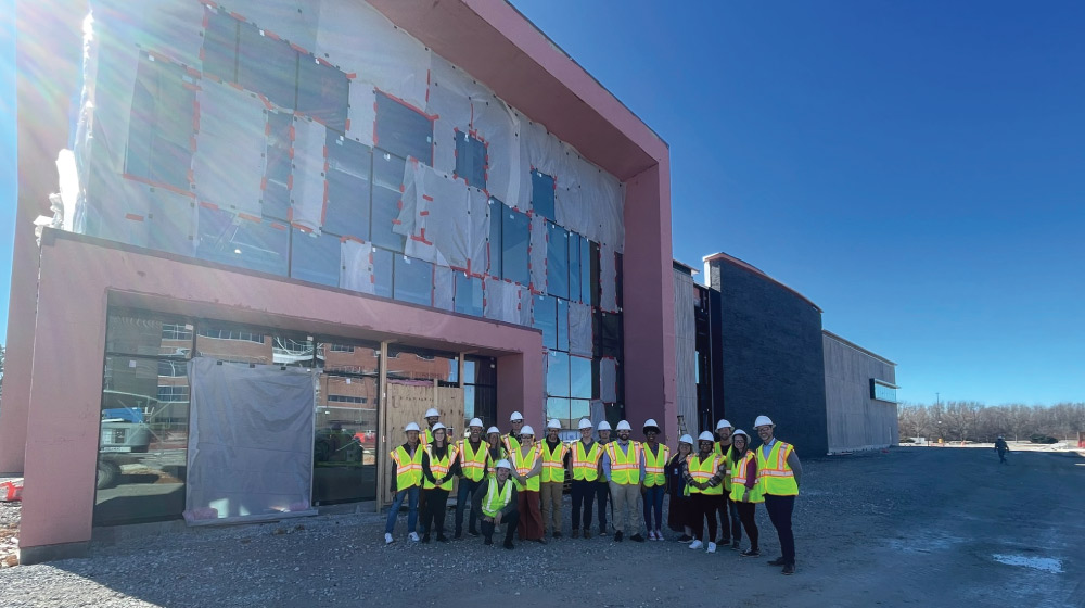 University of Arkansas McMillon Innovation Studio students outside Clubhouse